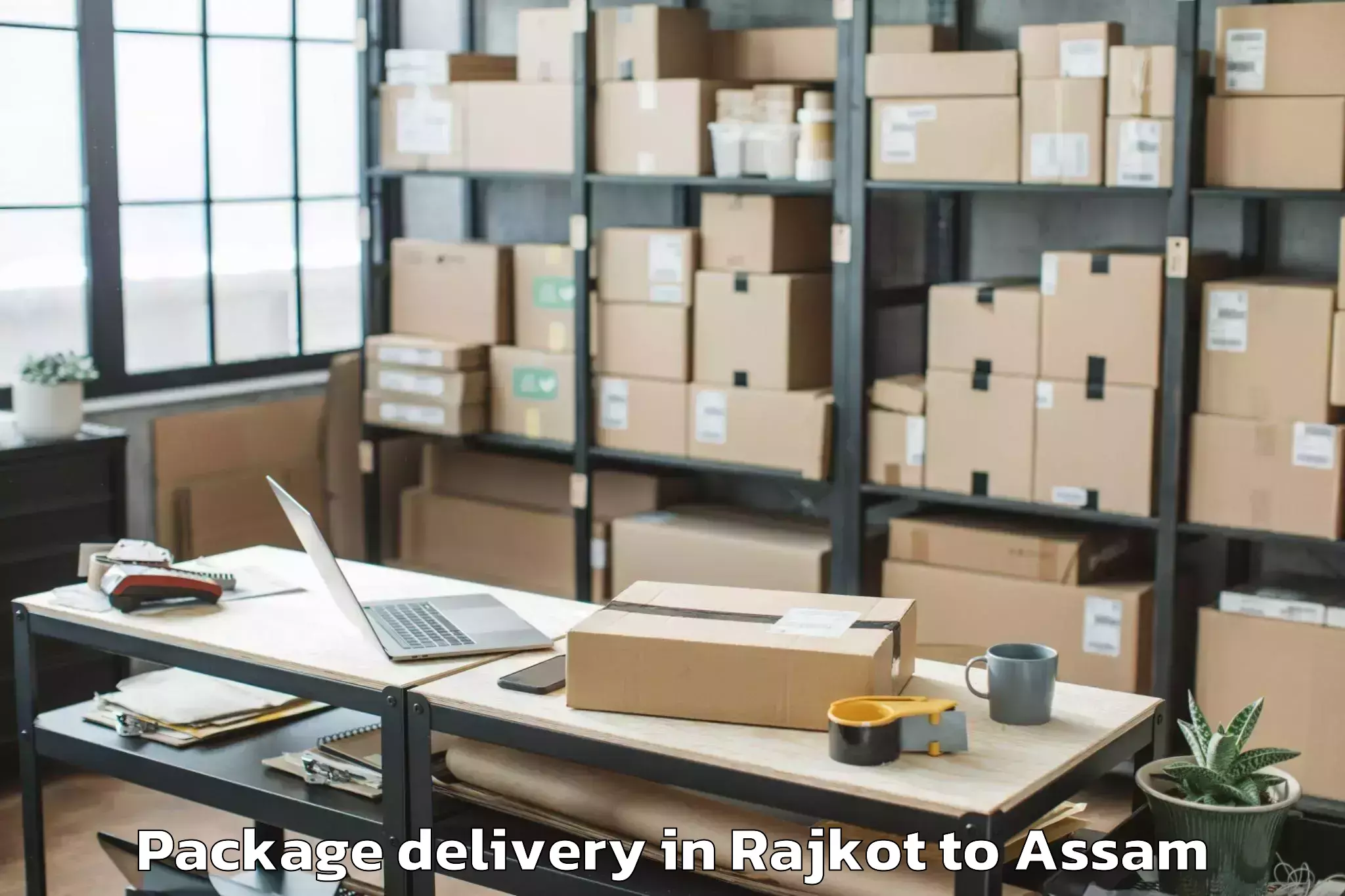 Affordable Rajkot to Sualkuchi Package Delivery